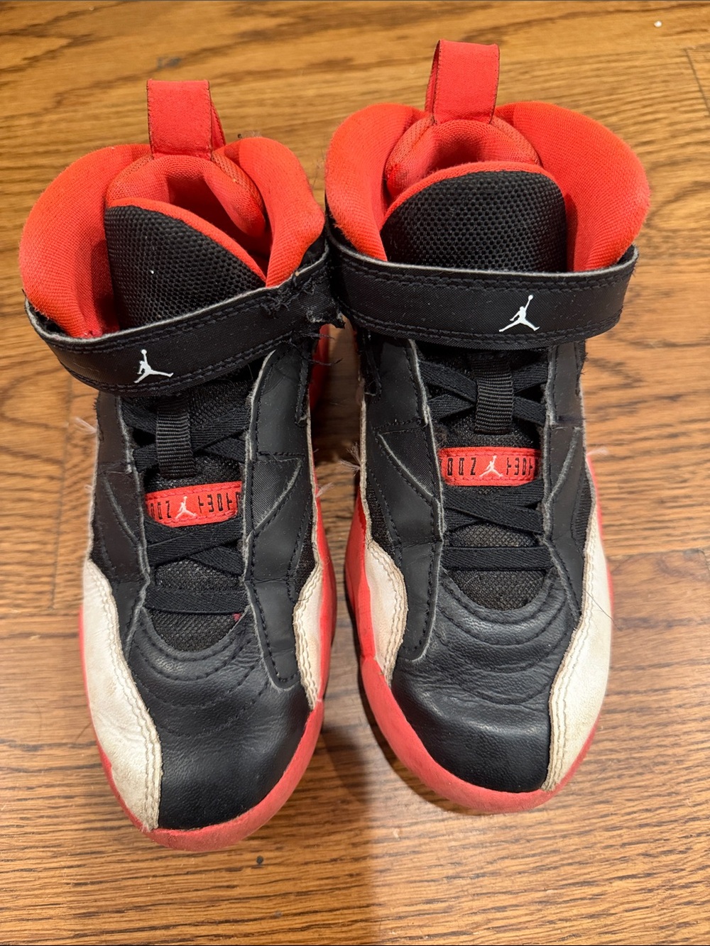Jordan Kids Black Red and White High-Top Sneakers
